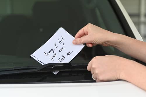 someone left a note your parked car they hit 