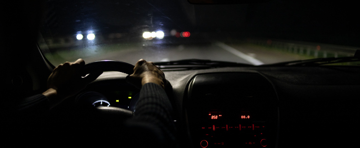 A man driving drunk at night