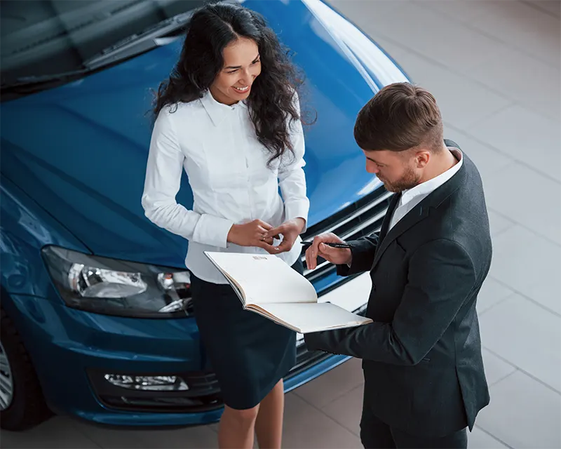 girl-is-smiling-female-customer-modern-stylish-bearded-businessman-automobile-saloon-img