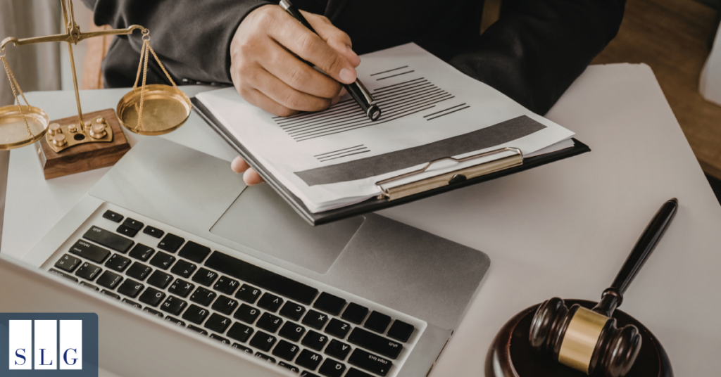 Person reviewing documents and deadlines to avoid mistakes in injury lawsuit