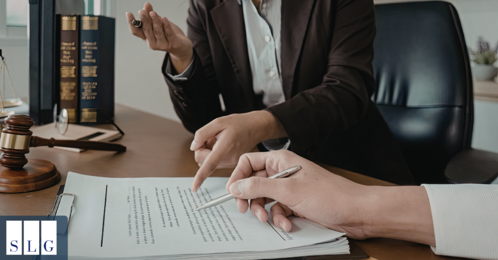 Lawyer reviewing documents related to a car accident case