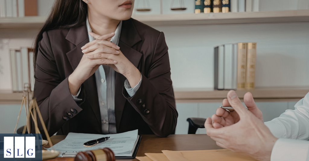 Client consulting lawyer about car accident settlement