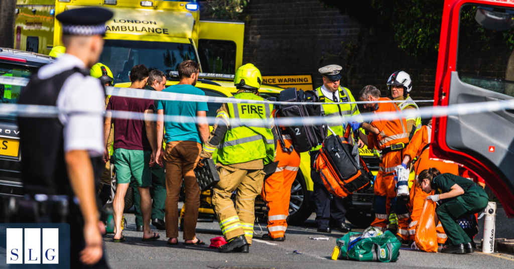 Personal injury attorney reviewing traffic collision case with injured client