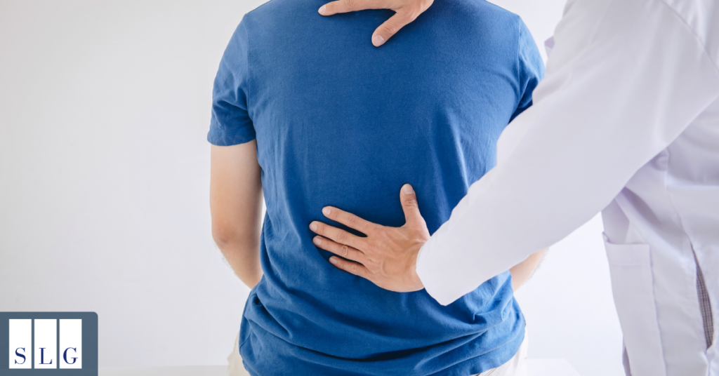 Patient undergoing physical therapy for lower back pain after an accident